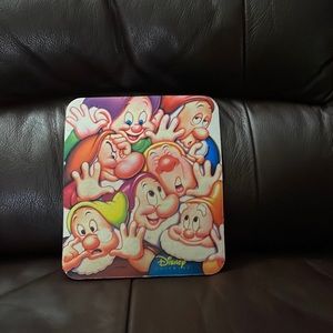 1990’s Disney mousepad. The Seven dwarfs.